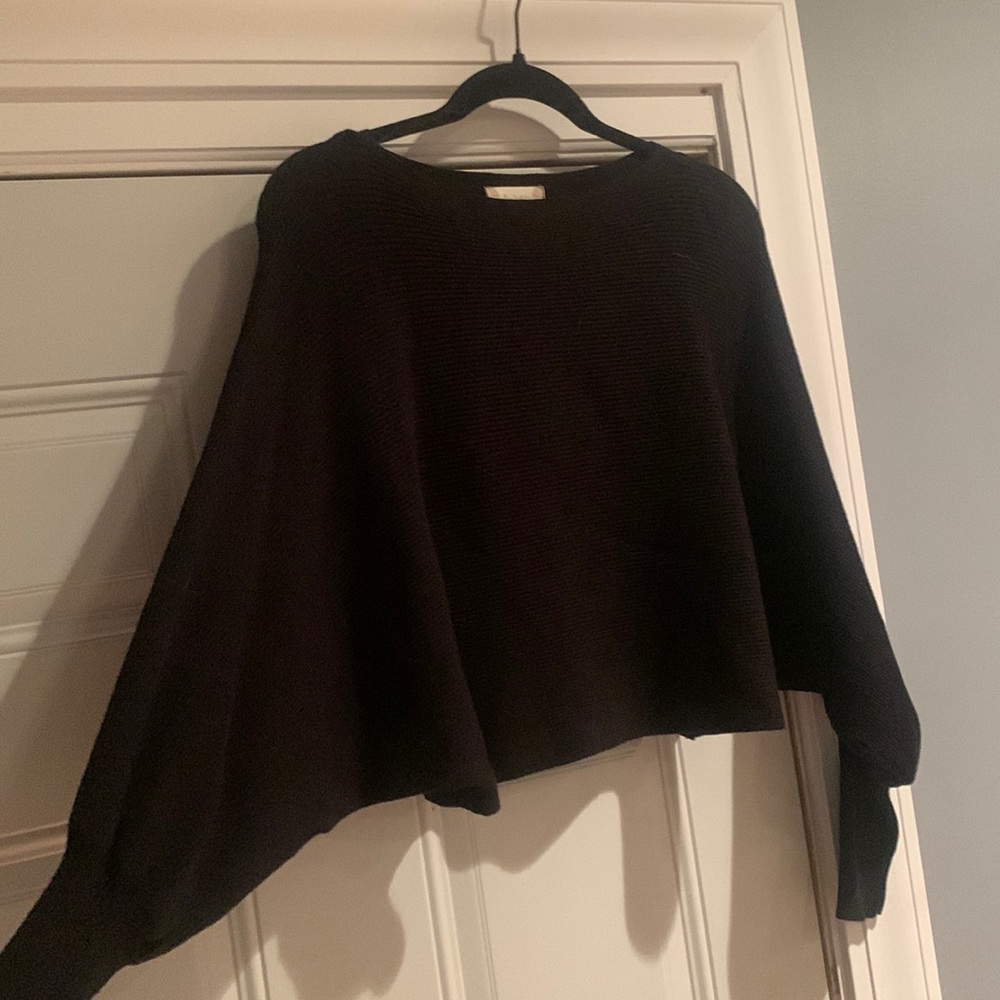 Like new!! Black Ribbed Sweater. Boat neck. Angel sleeves. Slightly cropped